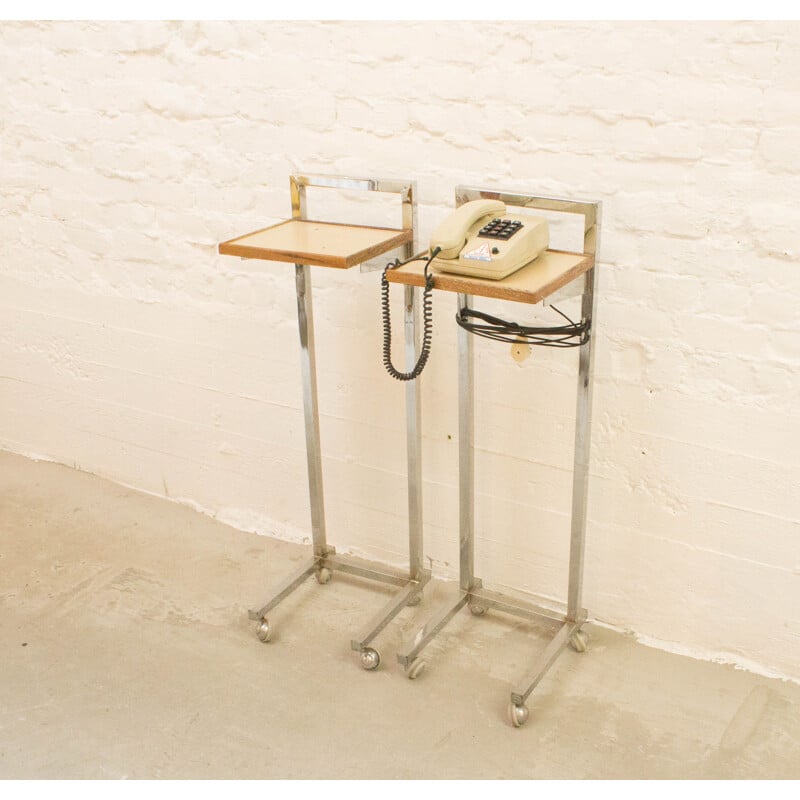 Vintage industrial telephone table on wheels