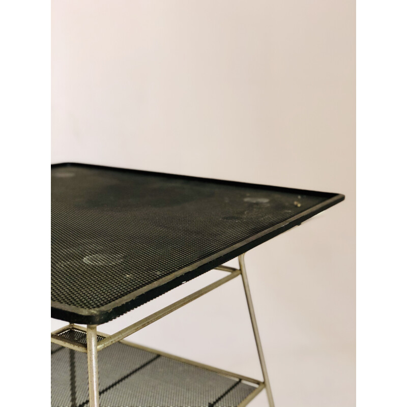 Side table in black metal perforated decor 