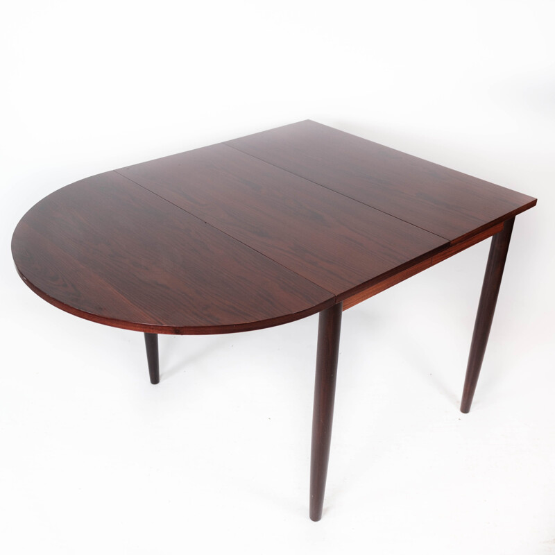 Vintage dining table in rosewood with extension plates by Arne Vodder, 1960s