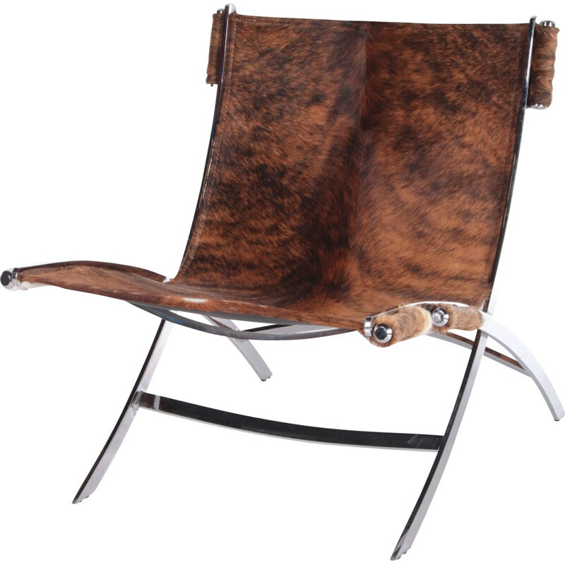 Vintage armchair with animal skin and heavy chrome base