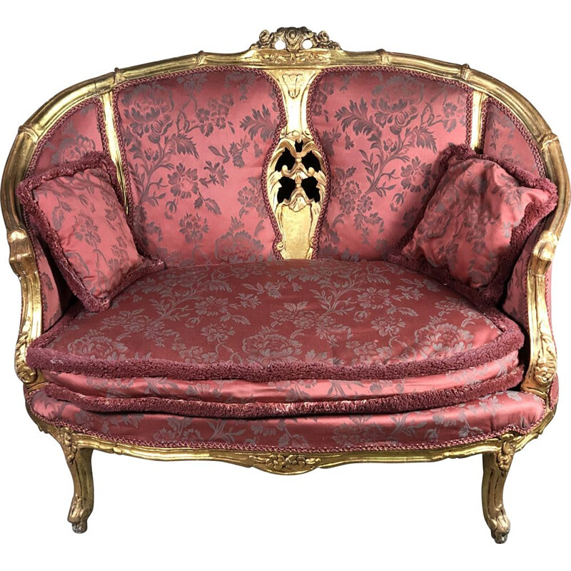Carved and upholstered gilded wood vintage sofa
