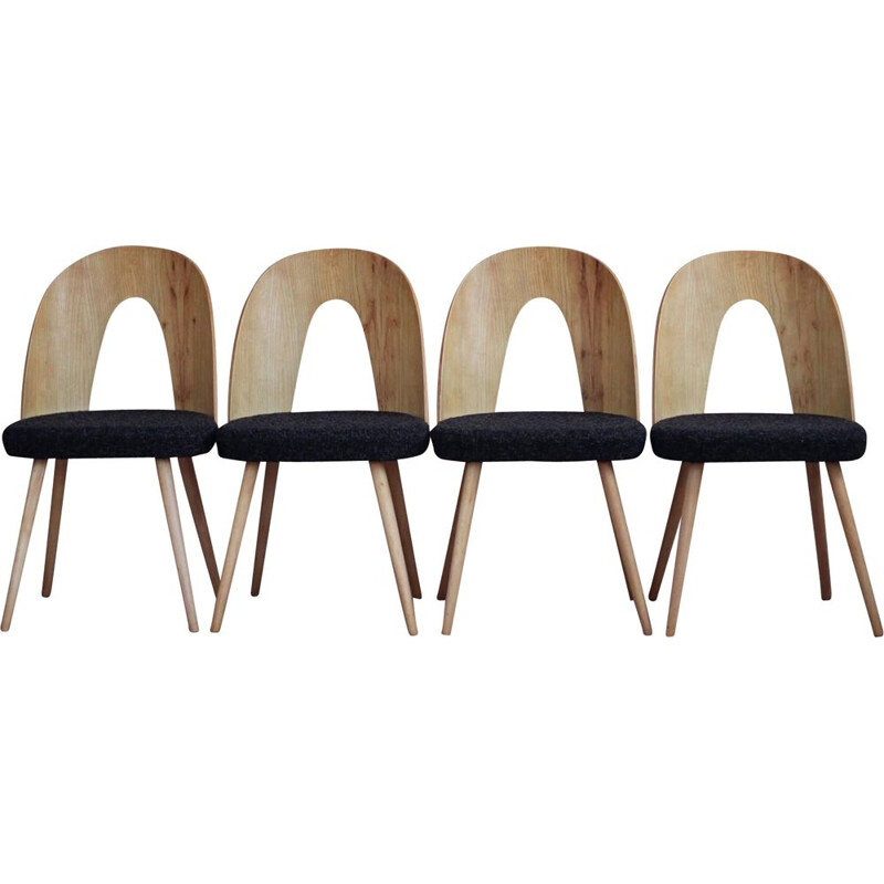 Set of 4 mid century dining chairs in black boucle by Antonin Šuman, 1960s