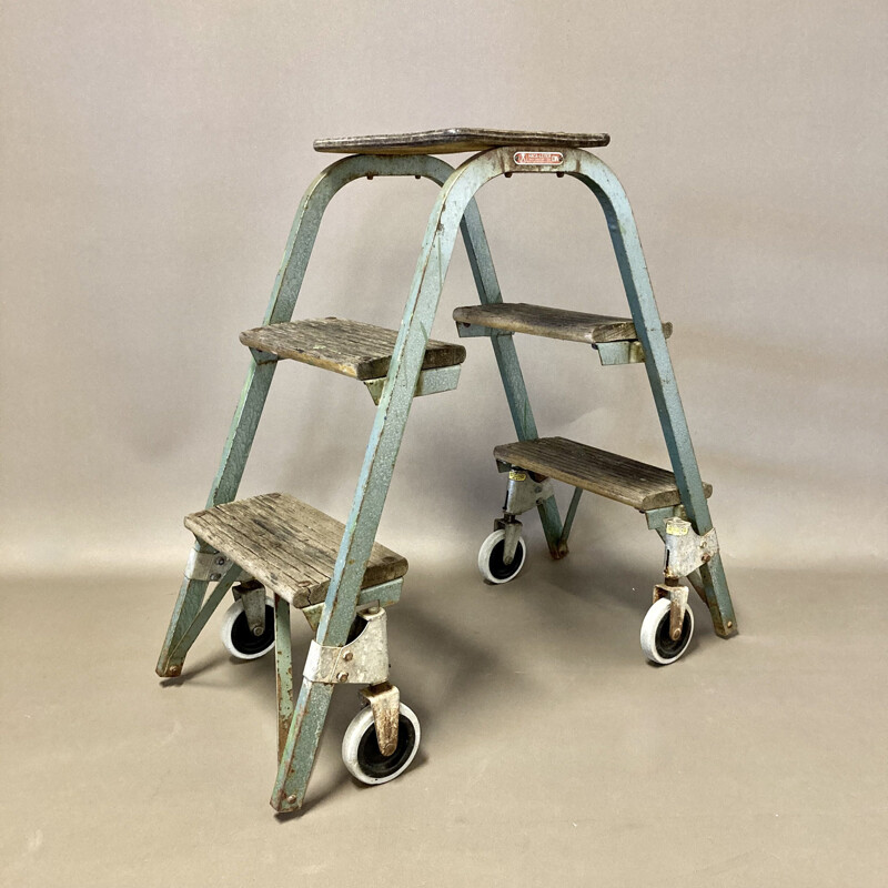 Vintage wood and metal rolling stool, 1950
