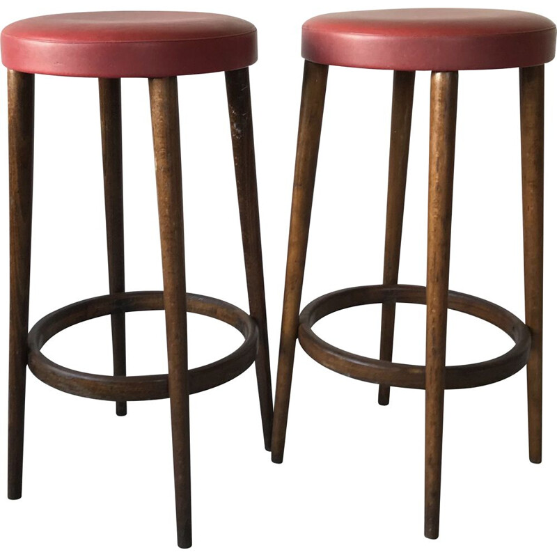 Pair of vintage bar stools in red imitation leather by Baumann