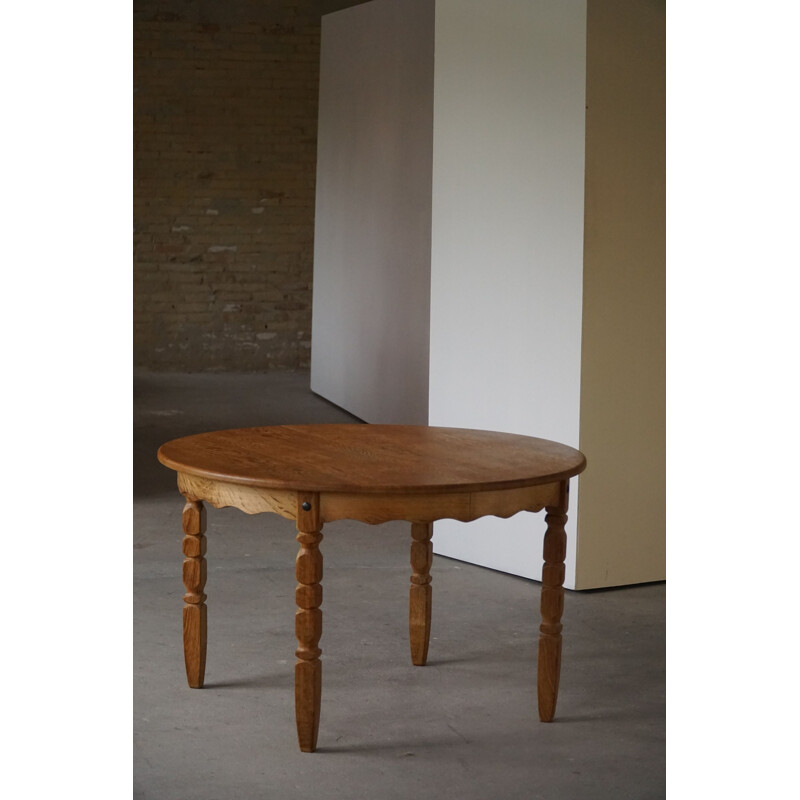Danish vintage round dining table in solid oakwood with two extensions, 1960s