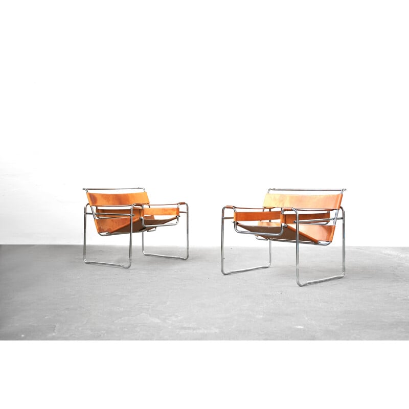 Pair of vintage leather and steel armchairs, 1970s