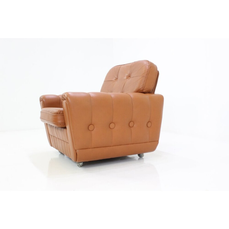 Mid-century light brown leather armchair with wheels - 1970s