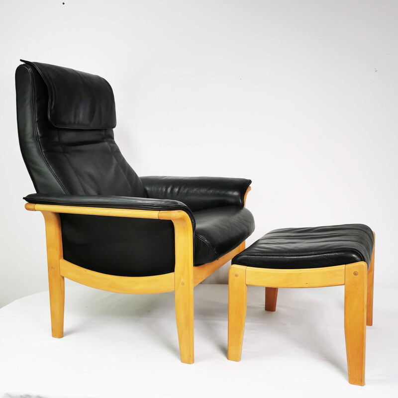 Vintage leather armchair with footrest, Denmark 1980s