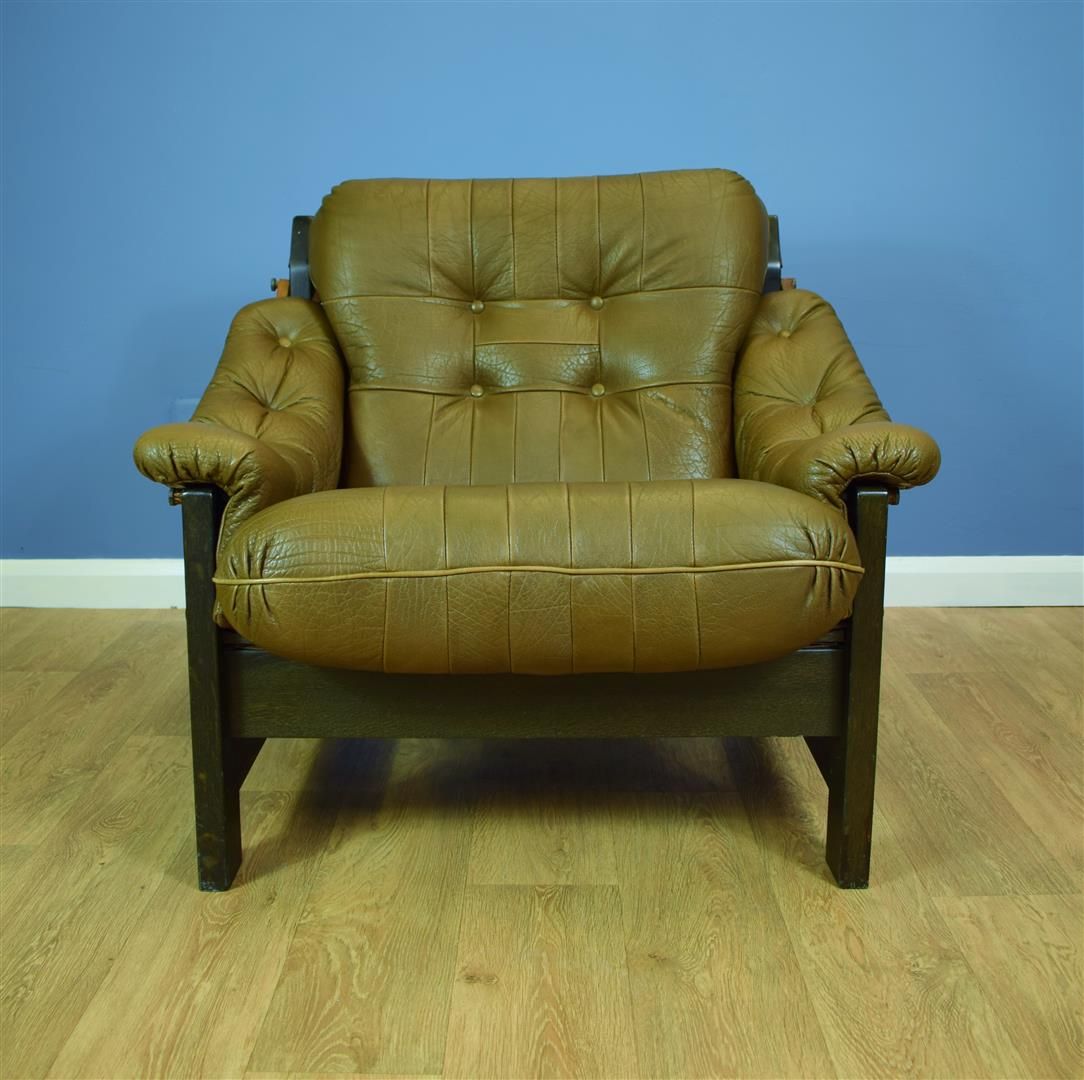 Vintage Danish armchair in brown leather - Design Market