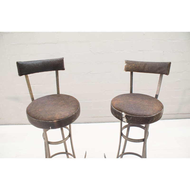 Set of 2 vintage Bar Stools in Iron and Cowhide