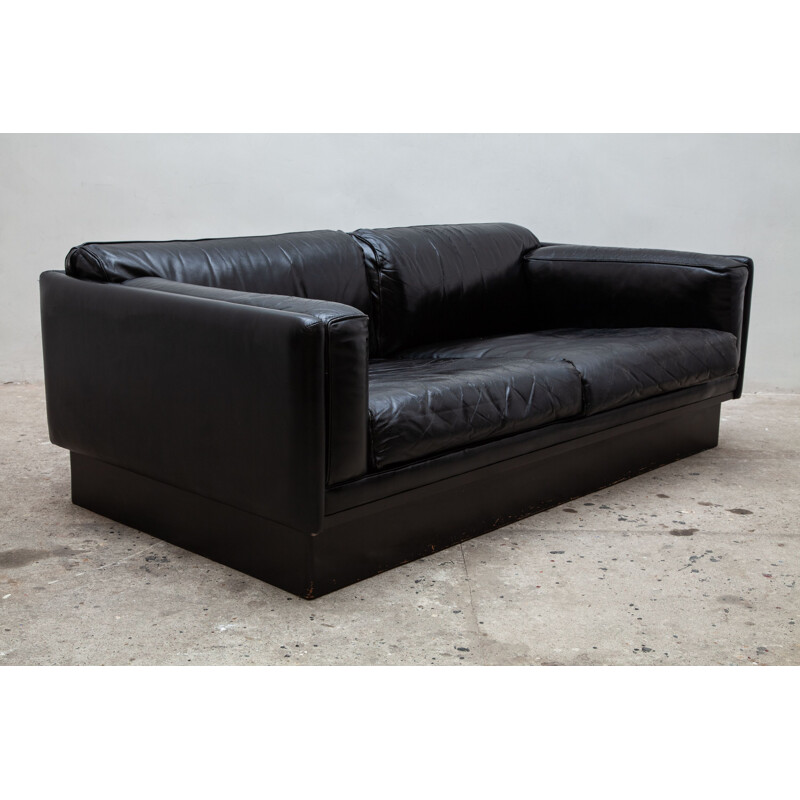 Vintage sofa in metal and black leather