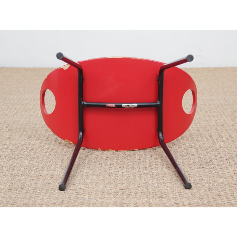 Red stool in steel by Olof Kettunen