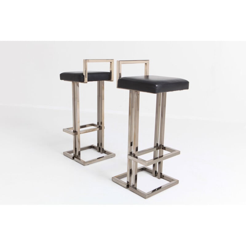Set of 2 vintage bar stools in chrome and black leather by Maison Jansen