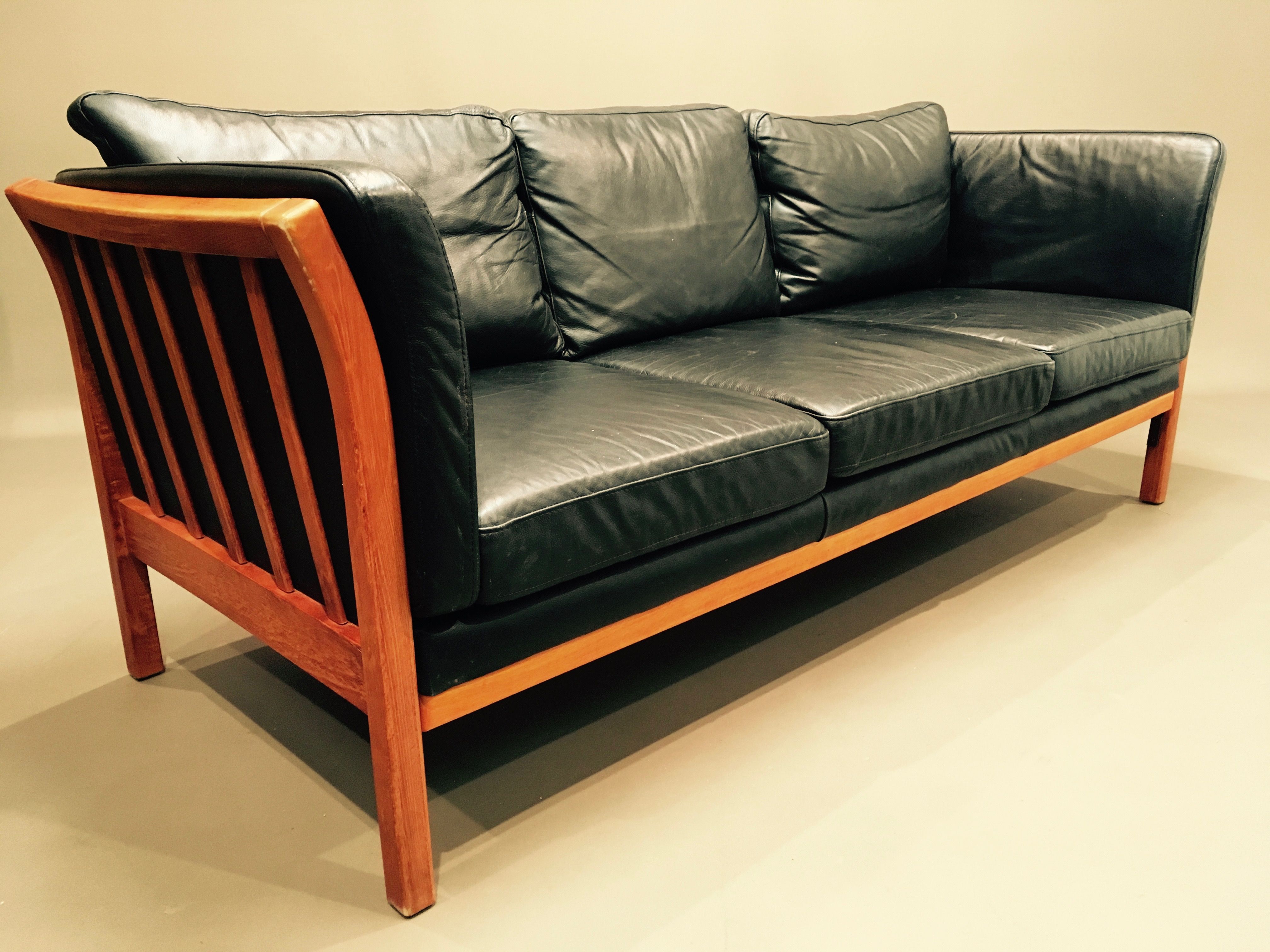 Vintage scandinavian  sofa  in black leather and wood 1980 