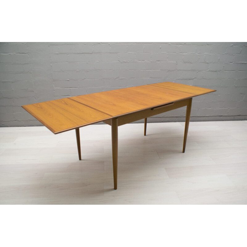 Scandinavian extendable dining table in teak