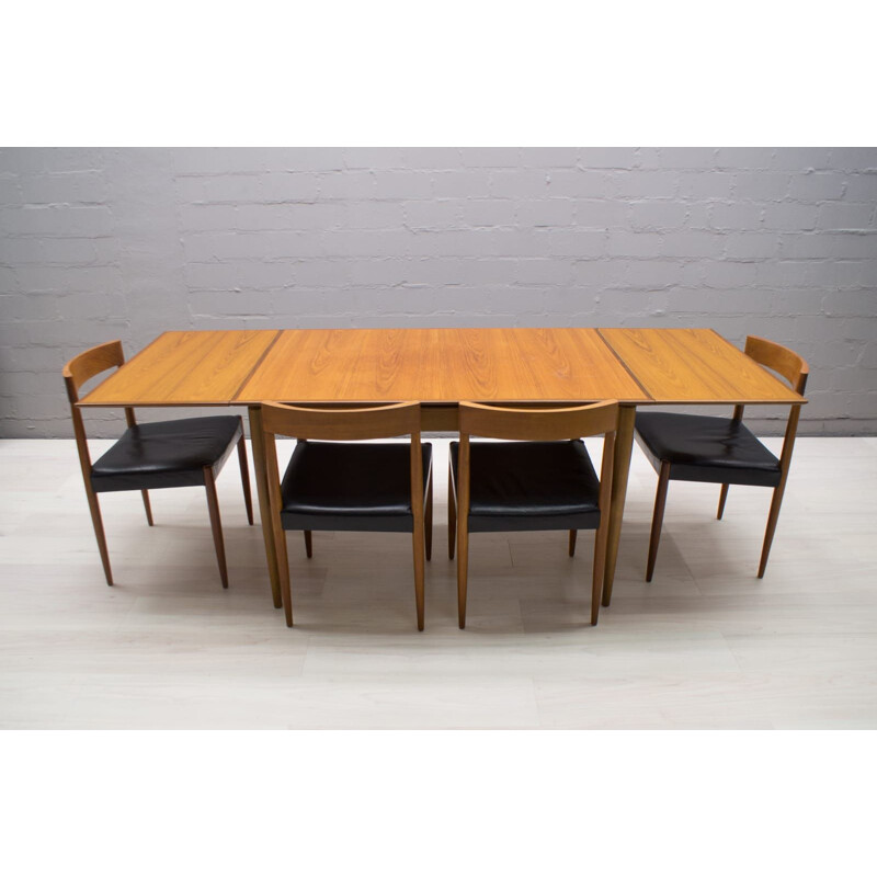 Scandinavian extendable dining table in teak