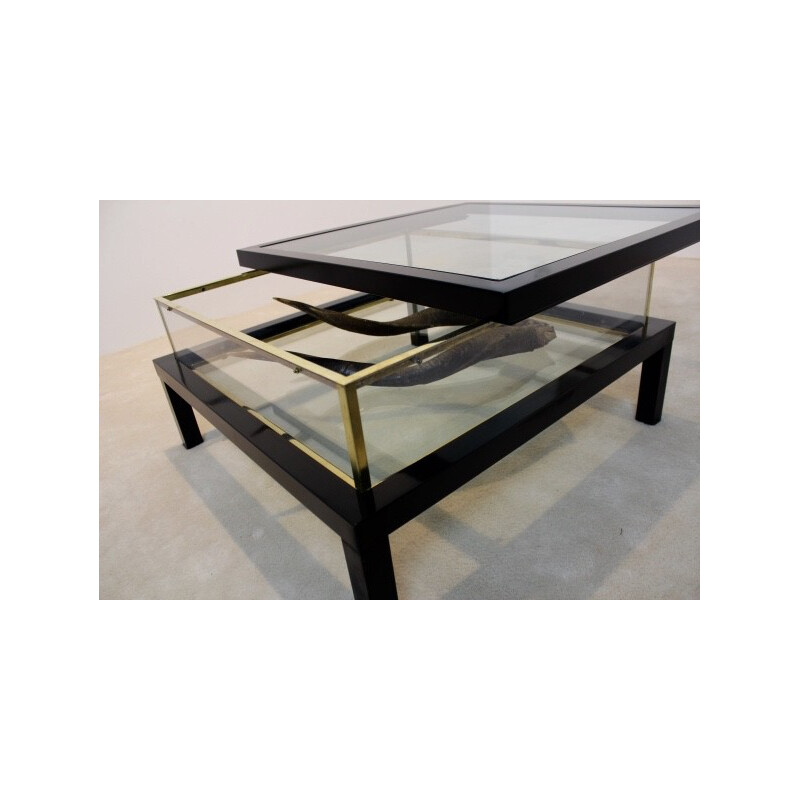 Modernist sliding top coffee table in brass and glass - 1970s