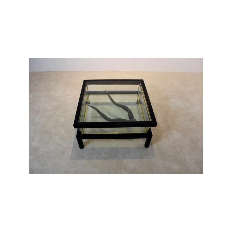 Modernist sliding top coffee table in brass and glass - 1970s